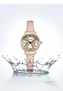Detailed view of the rose gold watch case splashing in water showing 3ATM waterproof feature