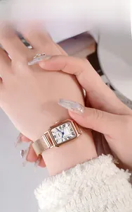 Elegant rose gold square watch with Roman numerals on a Milanese mesh strap