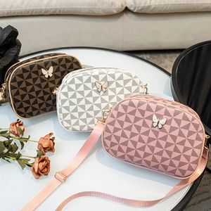 Sacs bandoulière vintage 2024 avec imprimé géométrique et décor de papillon en métal
