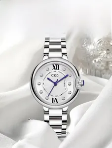 Detailed macro of GEDI luxury silver watch with wave pattern dial and blue hands