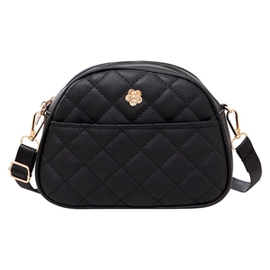 Chic black quilted messenger bag with gold flower clasp and adjustable shoulder strap
