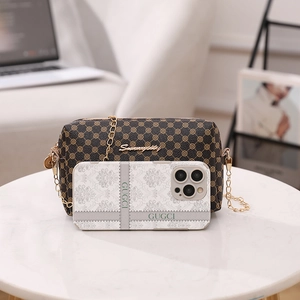 Brown monogram crossbody bag with gold chain and vintage circular pattern leather design
