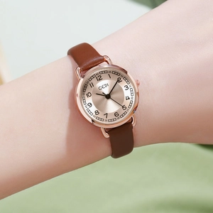 GEDI elegant women quartz watch with rose gold case, brown leather strap, and sunburst dial