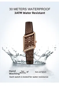 Macro view of vintage rectangular watch submerged in water splashes showing 3ATM waterproof feature