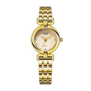 Close-up of GEDI gold ladies watch featuring a rhinestone dial and metal link bracelet