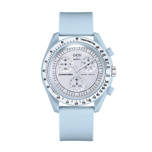 Macro shot of light blue silicone strap and chronograph dial details on quartz watch