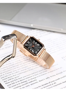 Close-up of GEDI vintage rectangular watch with black dial and rose gold mesh strap