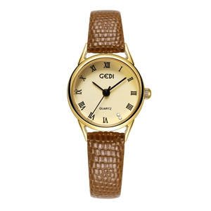 Vue détaillée de la montre quartz GEDI dorée avec chiffres romains et bracelet en cuir