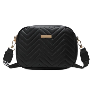 Modern black quilted camera bag with V-shaped wave stitching and logo woven strap