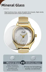 Detail of scratch-resistant mineral glass on a gold stainless steel mesh women watch