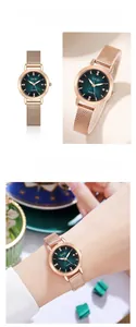 Detail view of GEDI watch with green sunray dial and rose gold mesh strap for women