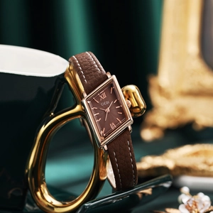 Vintage small square quartz watch for women with brown leather strap and gold case
