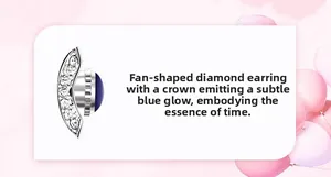 Macro detail of fan-shaped crown guard with cubic zirconia and blue cabochon gem