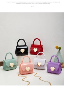 Detailed view of mini jelly bags in multiple colors with heart locks and spiral handles