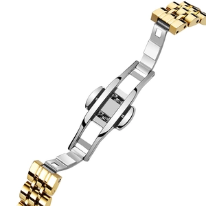 Elegant silver and gold stainless steel watch strap featuring a butterfly clasp closure