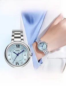 Detail view of GEDI silver quartz watch with a light blue dial and rhinestone-set bezel