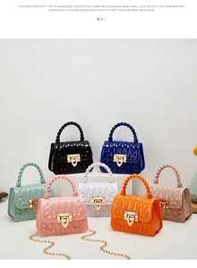 Mini jelly bags in multiple colors featuring rivet studs and woven texture handles