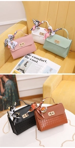 Variety of quilted chain strap bags with silk scarf handles in pastel and dark tones