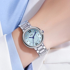 Elegant women's silver stainless steel watch with a sunray blue dial and crystal markers