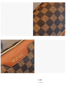 Detailansicht von Karomuster und Logoprägung an der Vintage-Zylindertasche