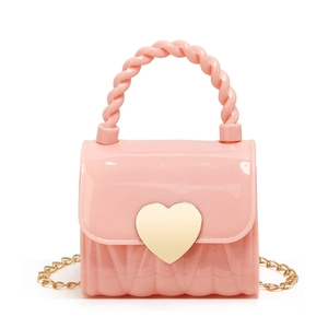Pink jelly mini handbag with heart gold buckle, twisted handle and chain strap