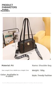 Detail view of checkerboard PU handbag with wide lettered strap on a white table
