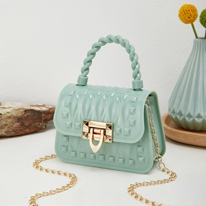 Mint green mini PVC jelly bag with quilted texture and gold chain strap for women