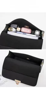 Detail view of mini woven crossbody bag interior showing storage for phone and makeup