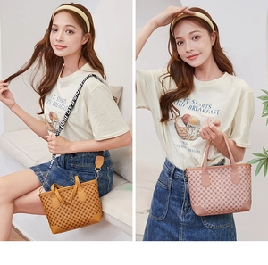 Detail of vintage tote bags with geometric patterns and branded crossbody straps