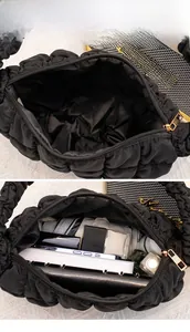 Makroaufnahme des geräumigen Innenraums dieser schwarzen Stepptasche mit Alltagsgegenständen