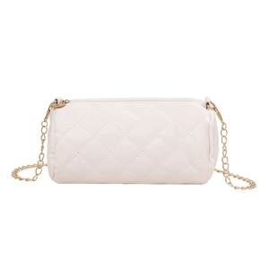 White quilted cylinder crossbody bag with gold chain strap and minimalist design