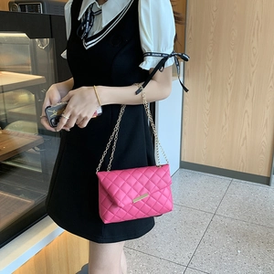 Elegant rose pink quilted chain bag for women with gold hardware and classic flap design