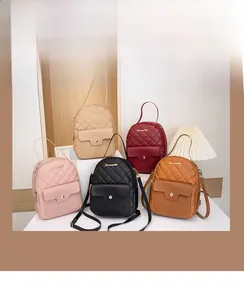 Detailed view of mini faux leather backpacks in five colors with diamond quilting