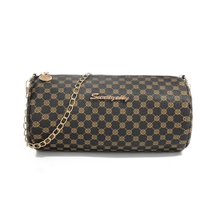 Deep brown cylindrical crossbody bag with floral pattern and gold chain strap