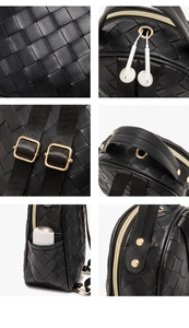 Detail of black woven leather backpack with gold hardware and headphone port