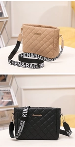 Close-up of quilted PU leather crossbody bags with metal logo and wide lettered canvas straps