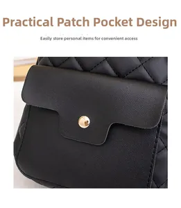Detail of quilted leather backpack featuring a front pocket with round gold metal buckle