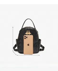 Quilted black mini backpack with swan lock detail and 21x17x8 cm size measurements