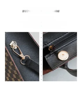 Macro shot of gold-tone hardware clasp and zipper on black embossed leather handbag