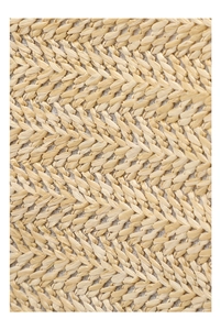 Gros plan détaillé du matériau en paille tressée avec texture à motif en chevrons
