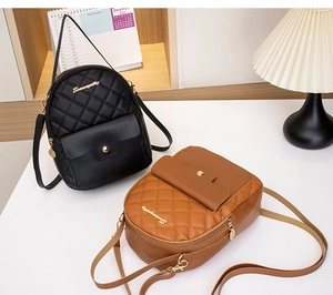 Close-up of mini quilted PU leather backpacks in black and brown with gold hardware