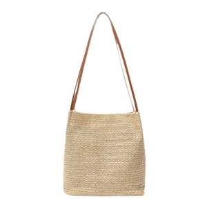 Sac fourre-tout en paille tissé à la main avec anses cuir marron et motif beige