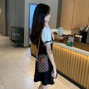 Retro checkered mini crossbody bag for women with leather strap and metal clasp