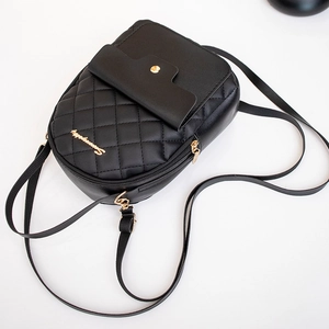 Women's black quilted PU leather backpack with gold hardware and embroidery details