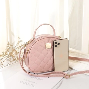 Pink quilted semi-circle handbag with golden clasp and adjustable shoulder strap