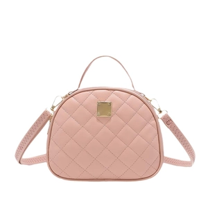 Pink quilted fashion handbag with golden hardware and adjustable shoulder strap for women