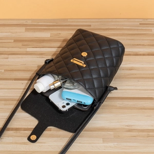 Classic black quilted leather bucket crossbody bag with gold hardware for women