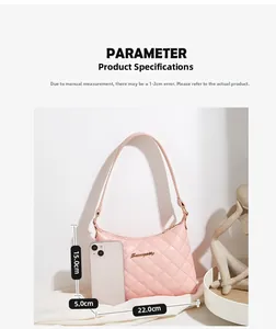 Pink quilted shoulder bag detail showing dimensions 22cm x 15cm x 5cm for sizing guide