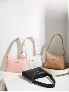 Detailed angle display of quilted underarm bags in pink, white, khaki, and black colors