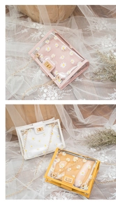Detailed view of PVC daisy chain bags in pink, white, and yellow with inner pouches